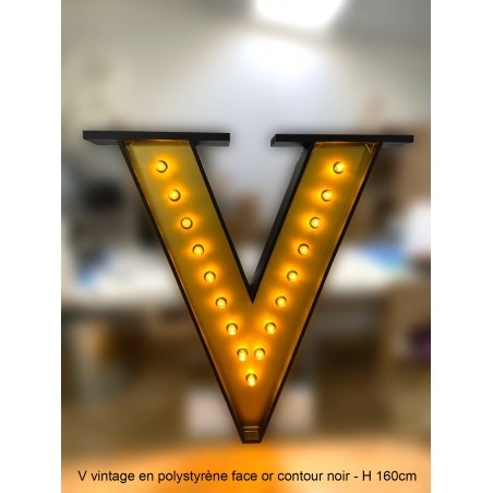 V vintage en polystyrène face or contour noir - H 160cm